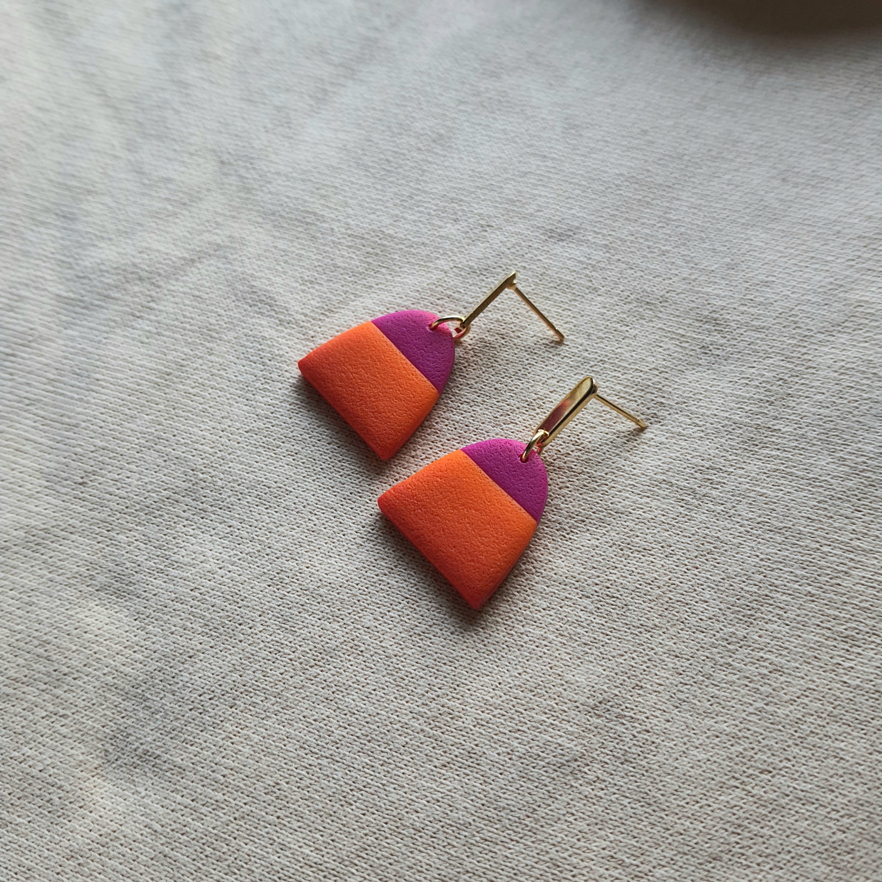 Magenta and orange dangle earrings