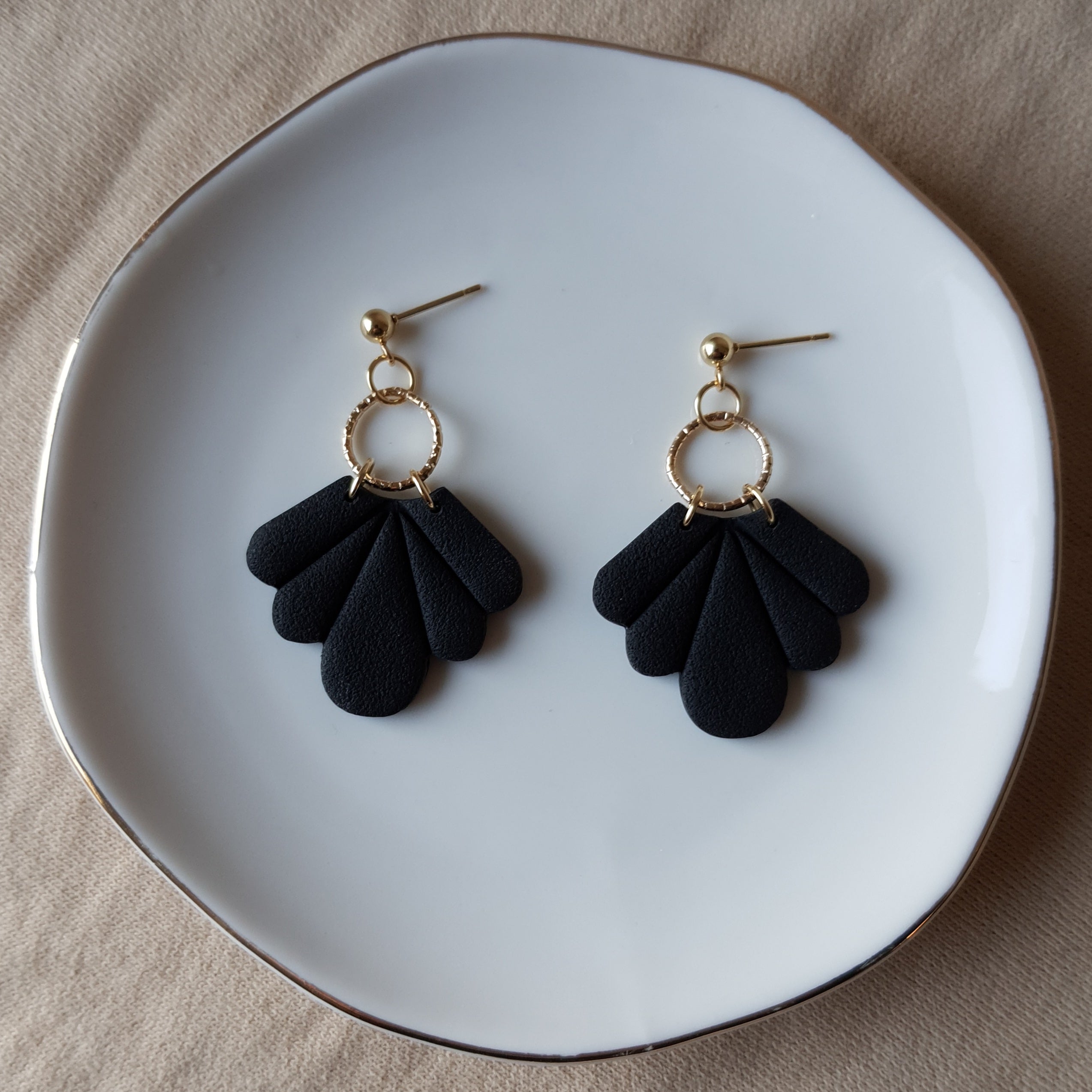 Black fan dangle earrings