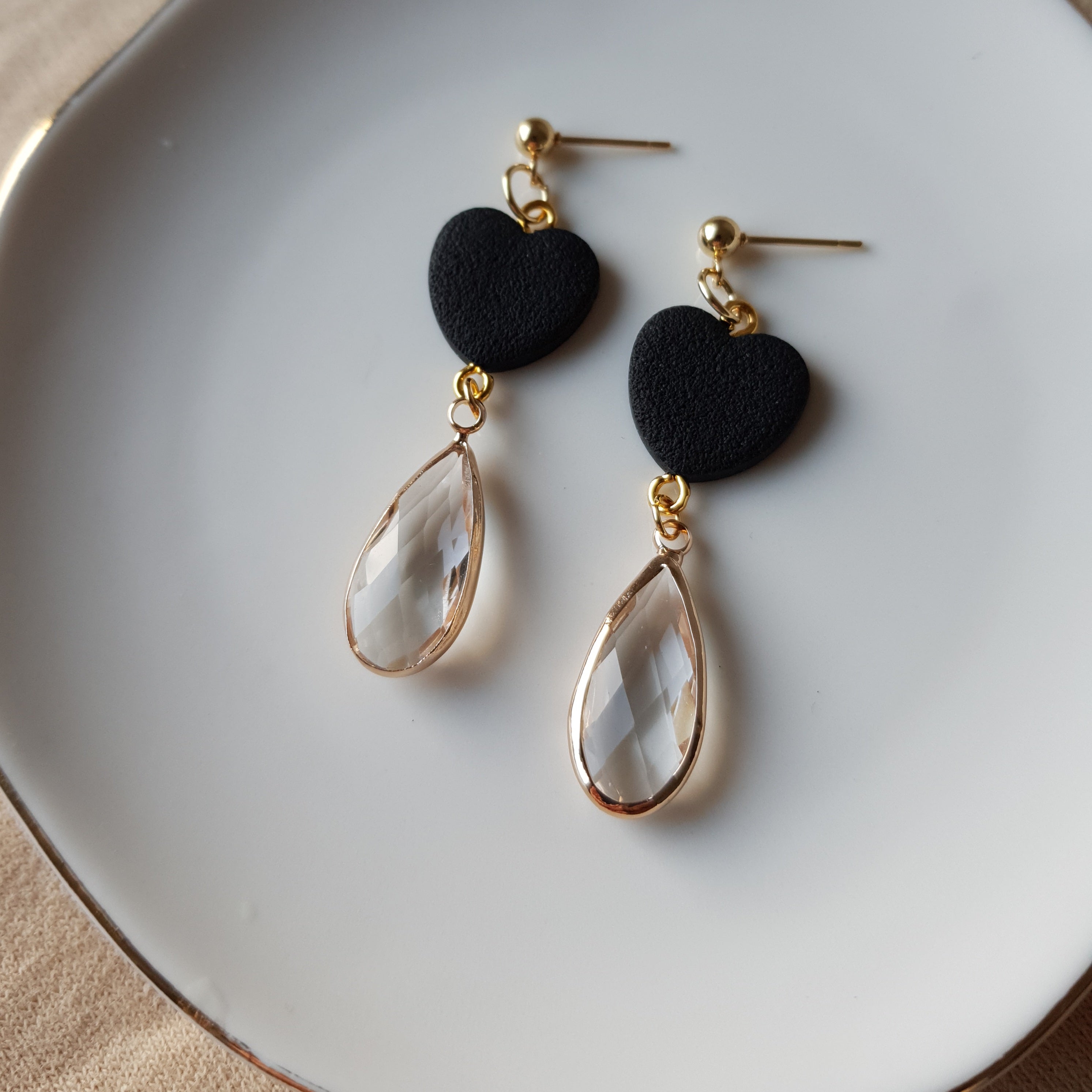 Black heart dangle earrings