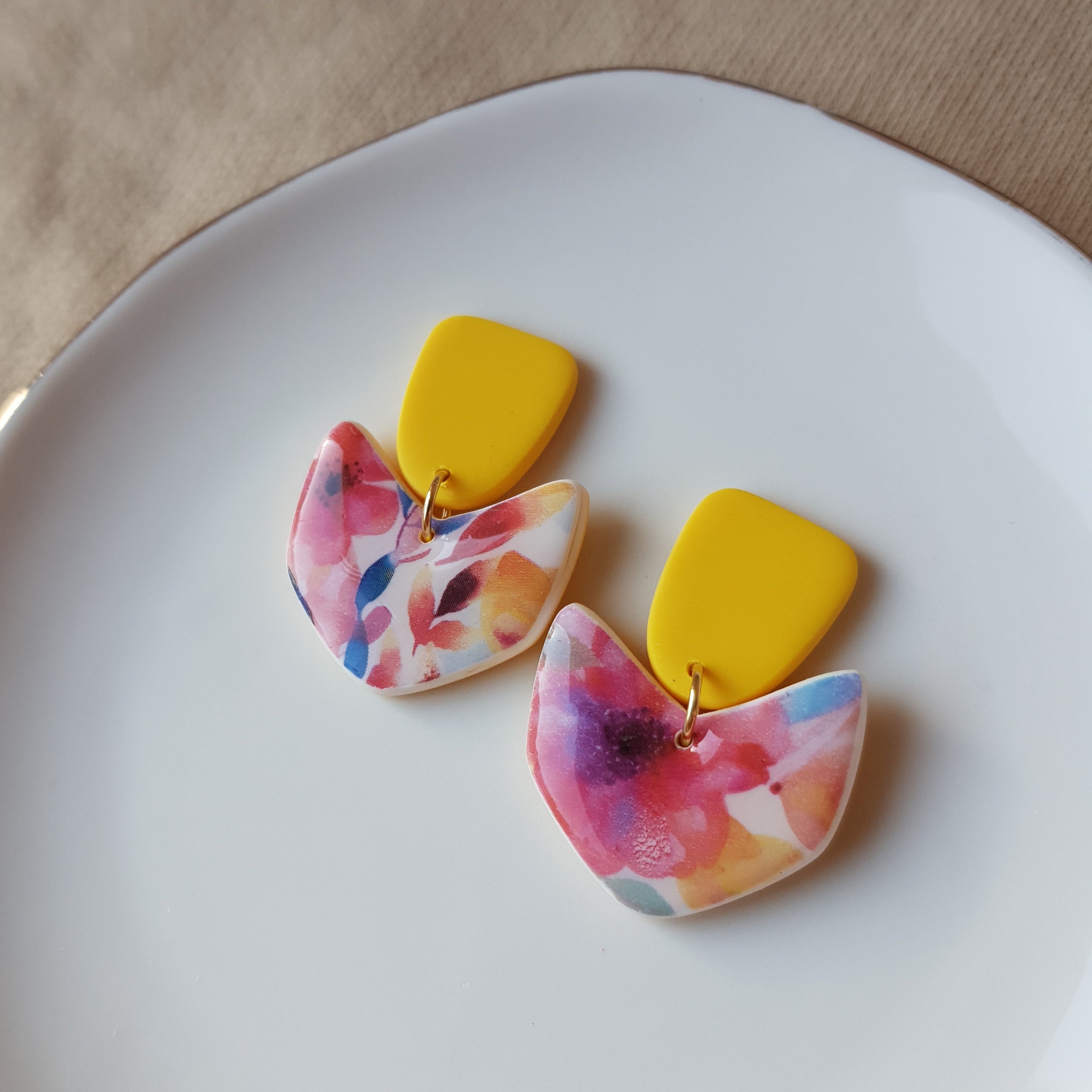 Yellow and floral dangle earrings