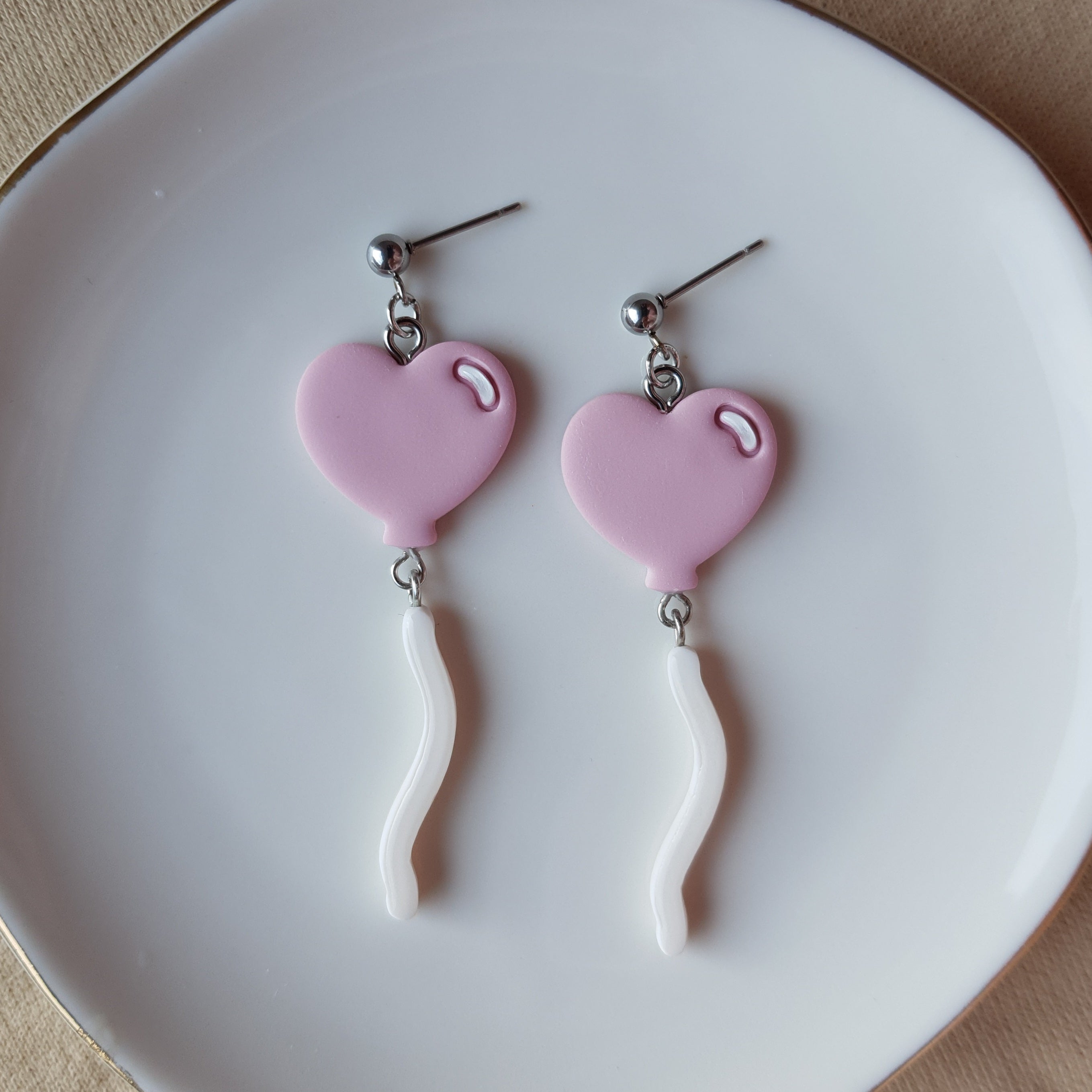 Pink balloon dangly earrings