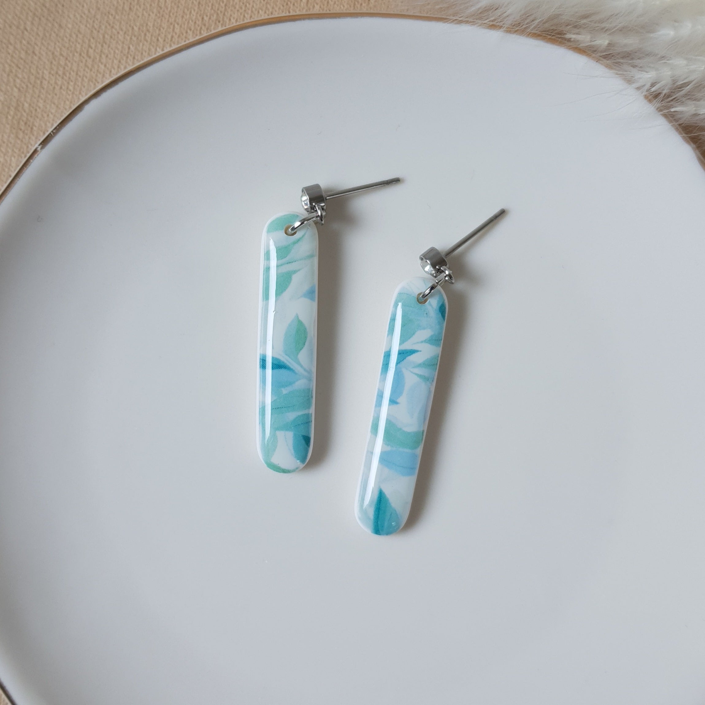 Oval blue leaf earrings