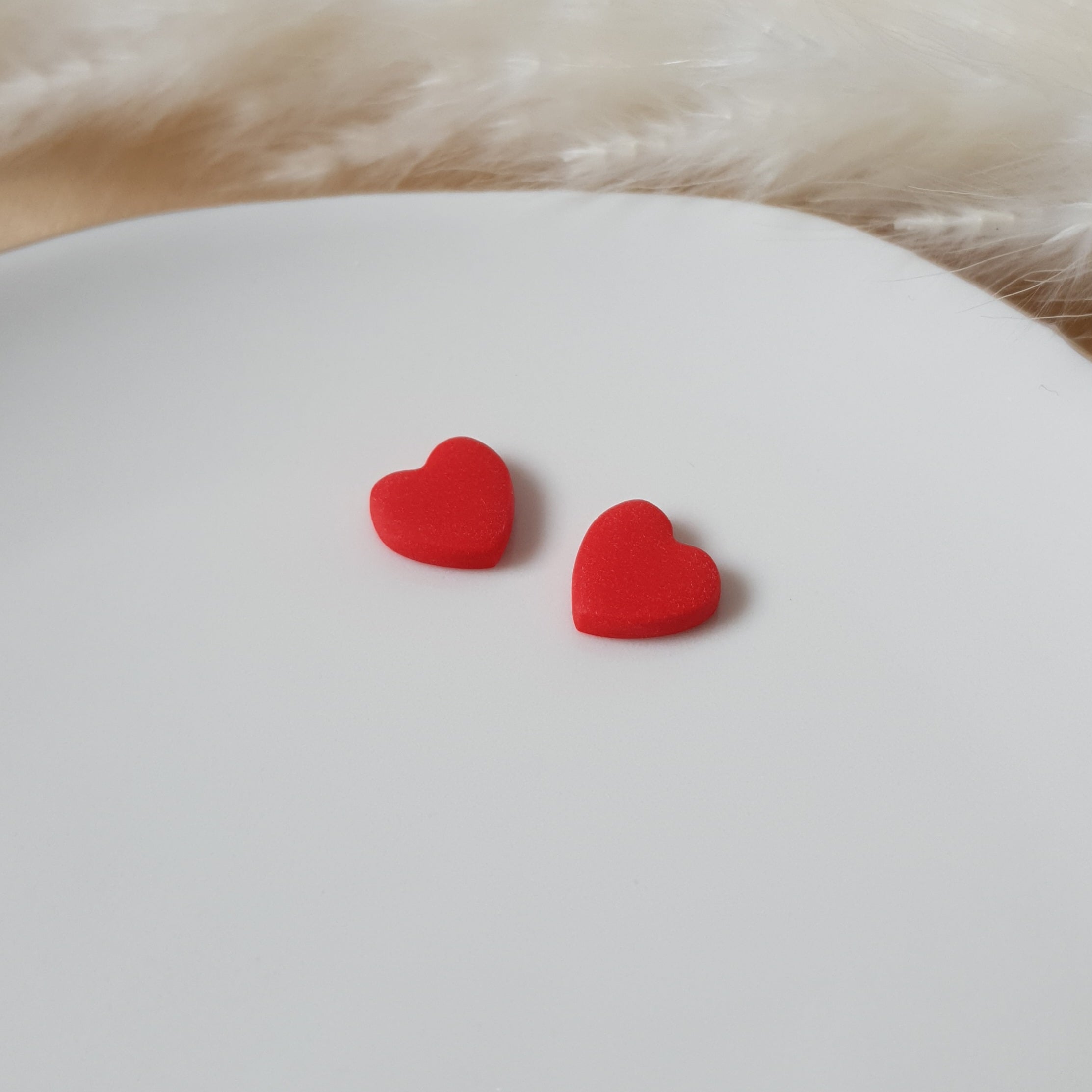 Mini red heart stud earrings