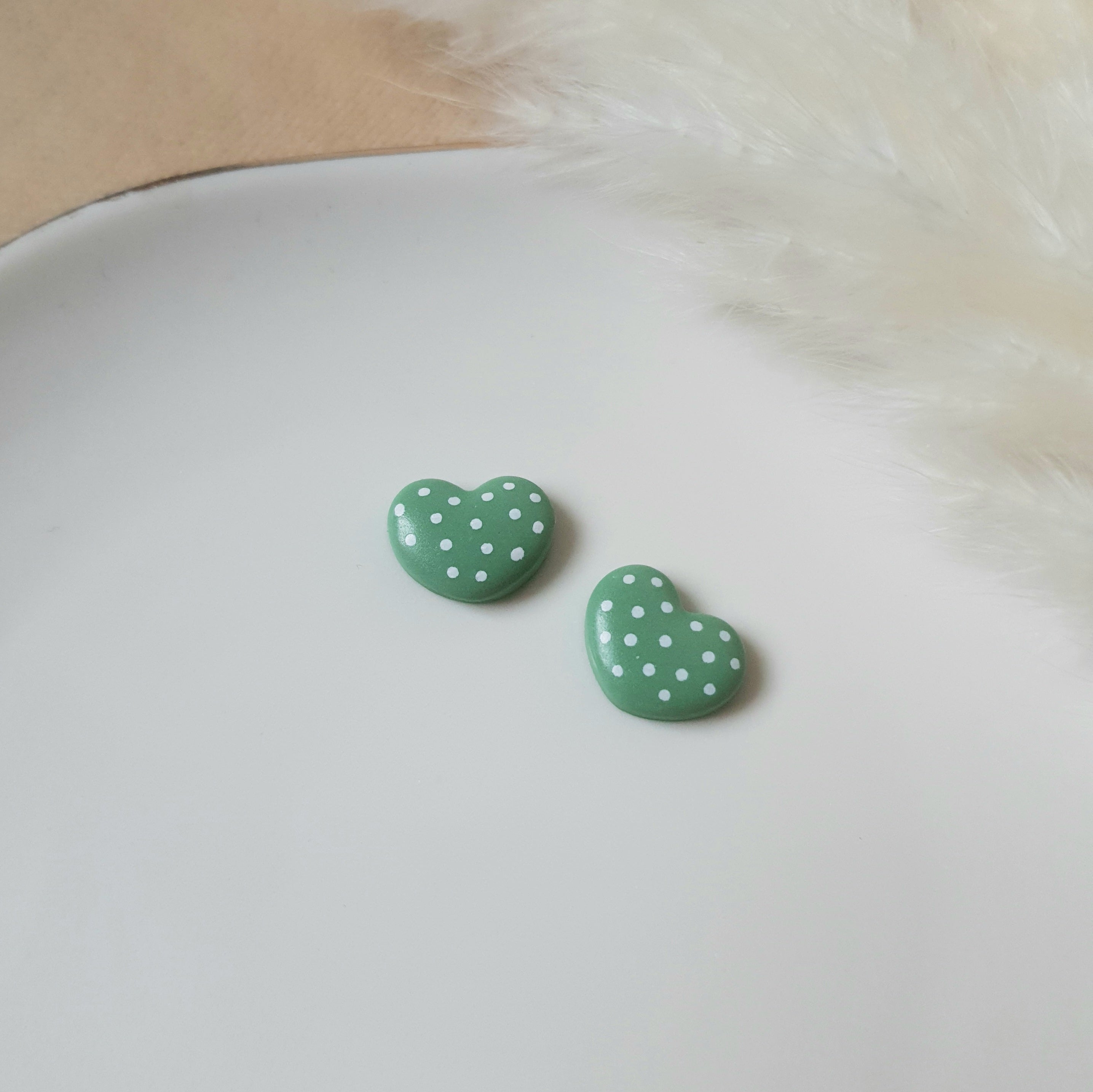 Green hearts stud earrings