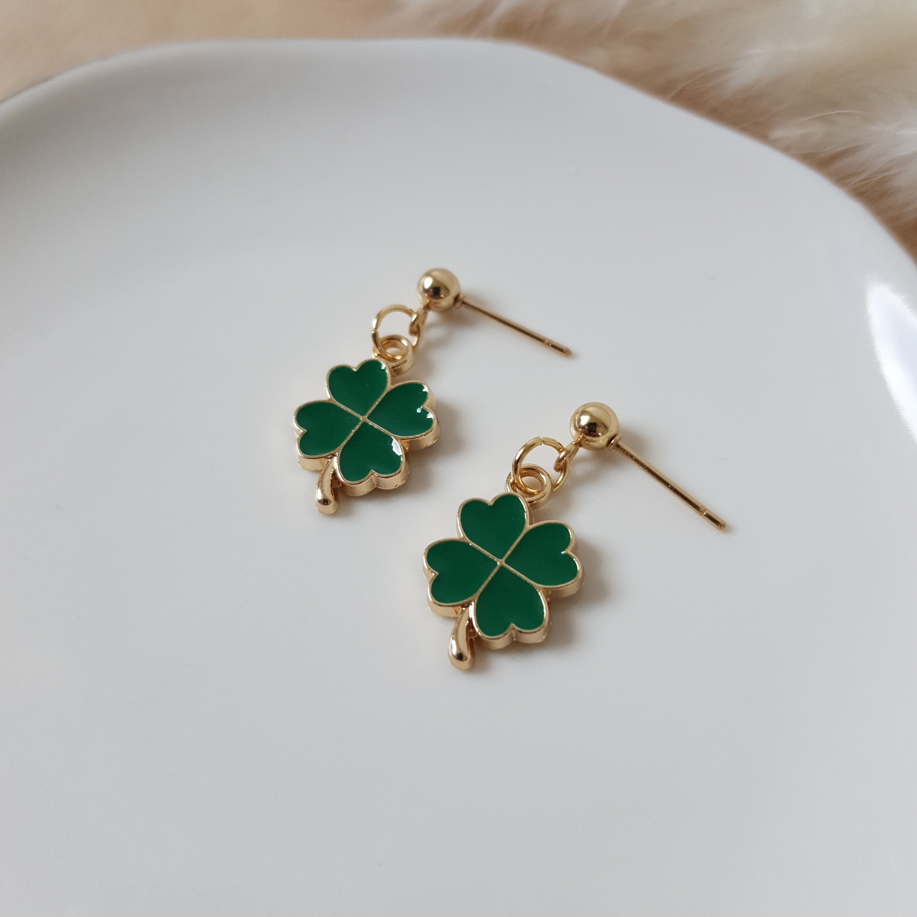 Green four leaf clover earrings