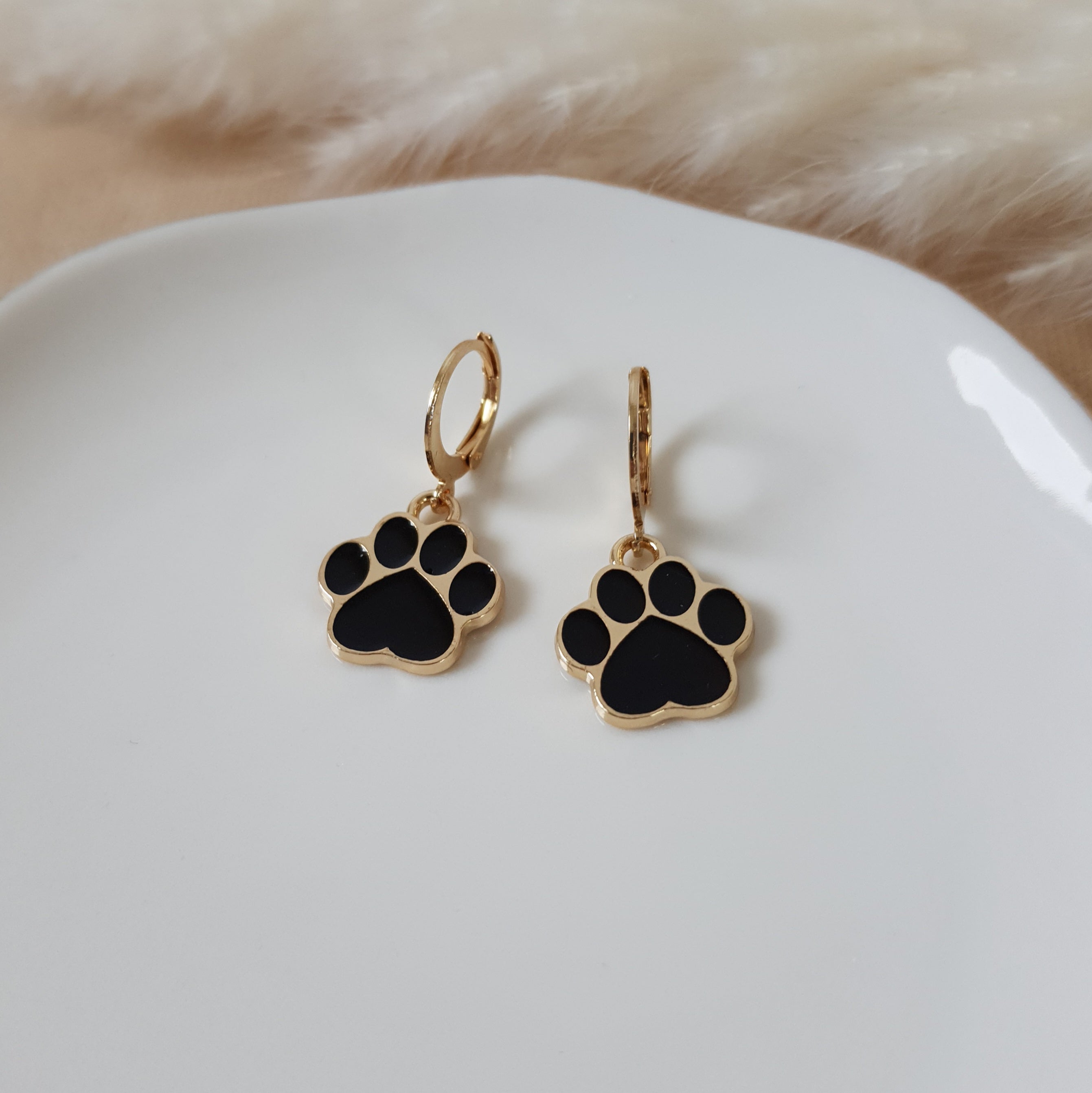 Black paw earrings