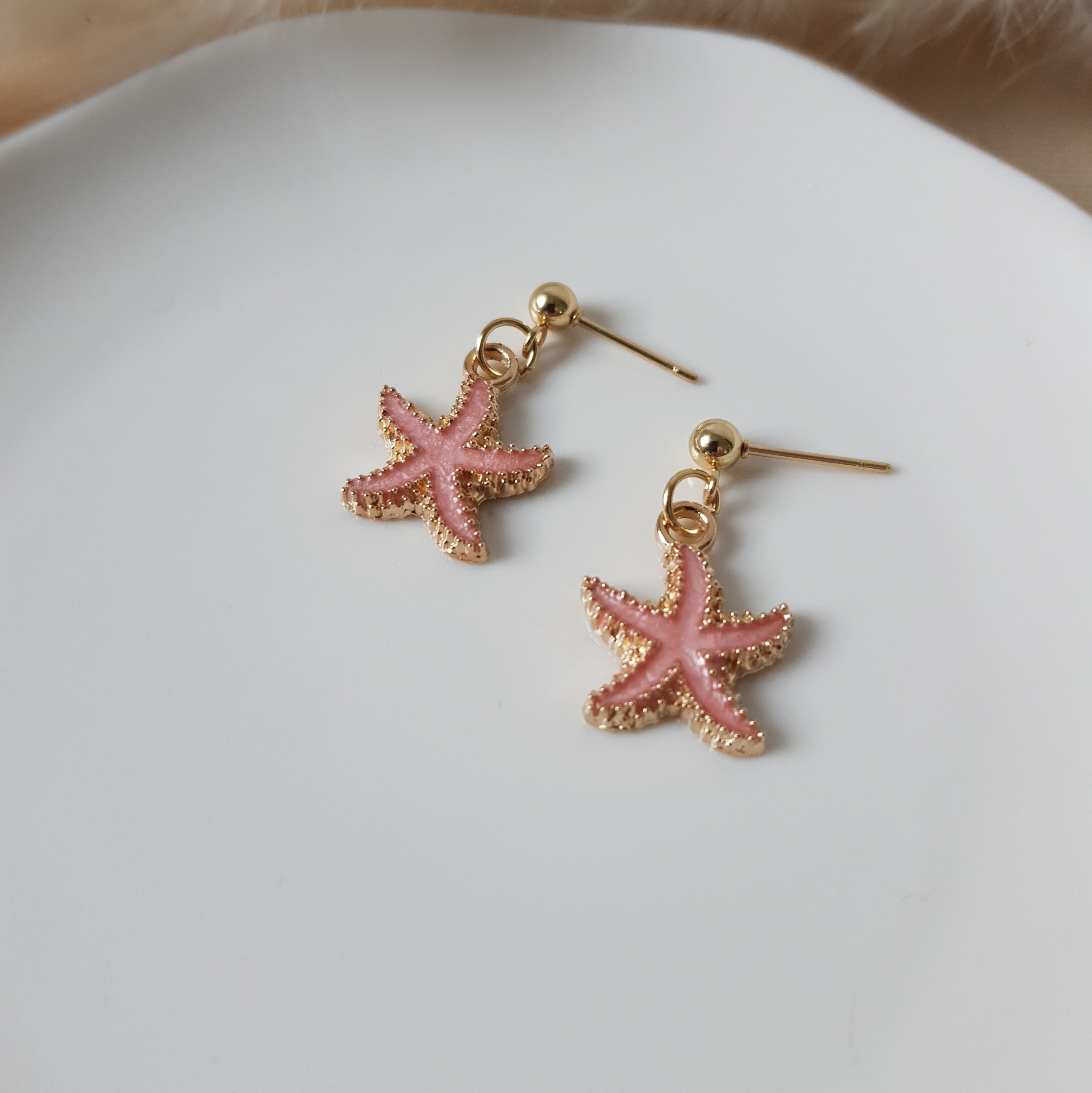 Pink sea star earrings
