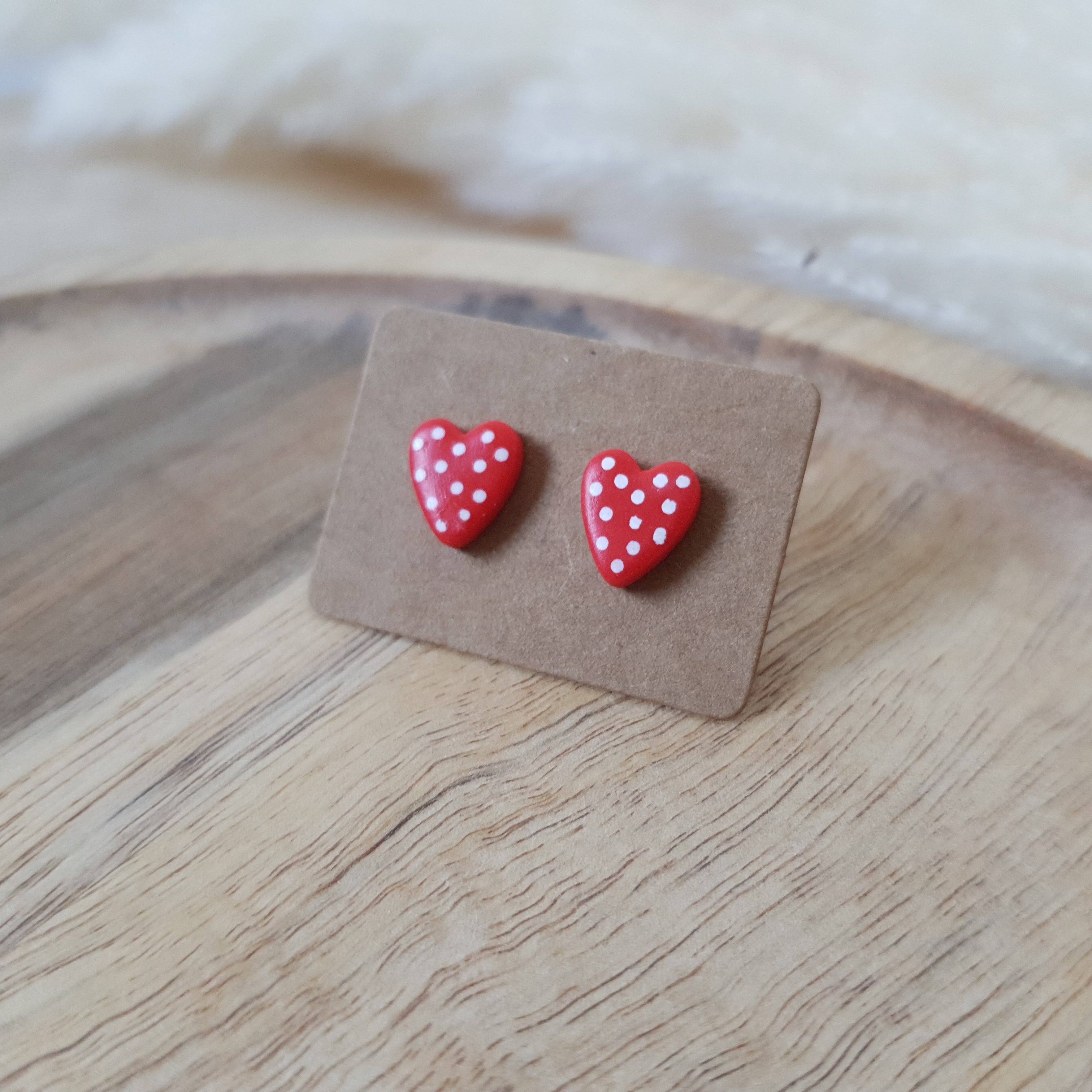 Small spotted red hearts