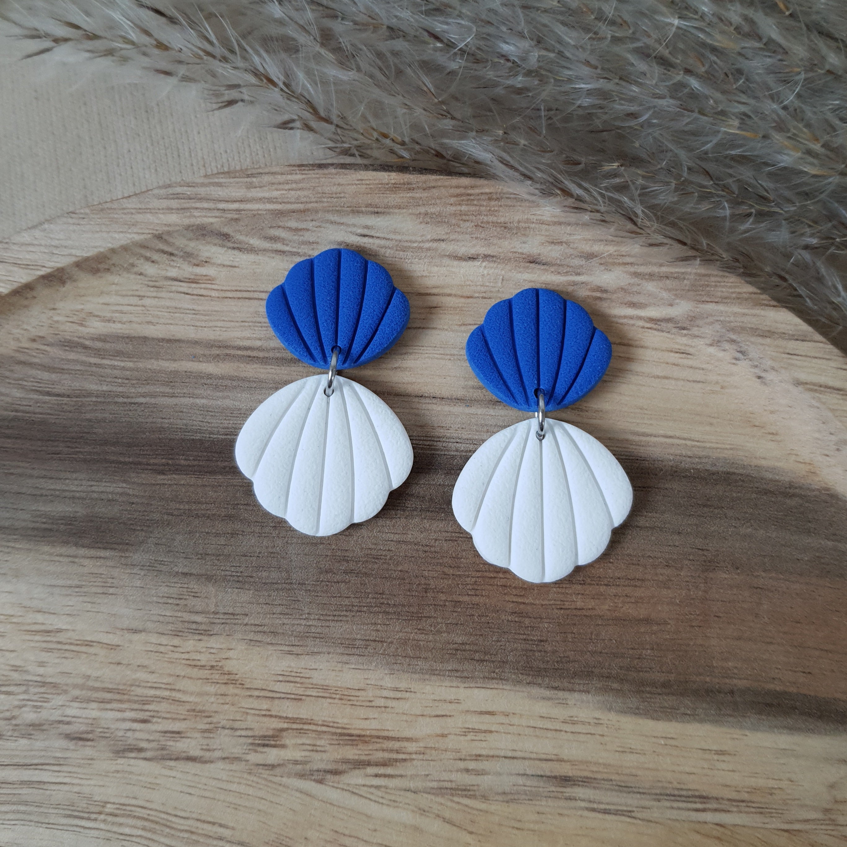 Blue and white shell dangles