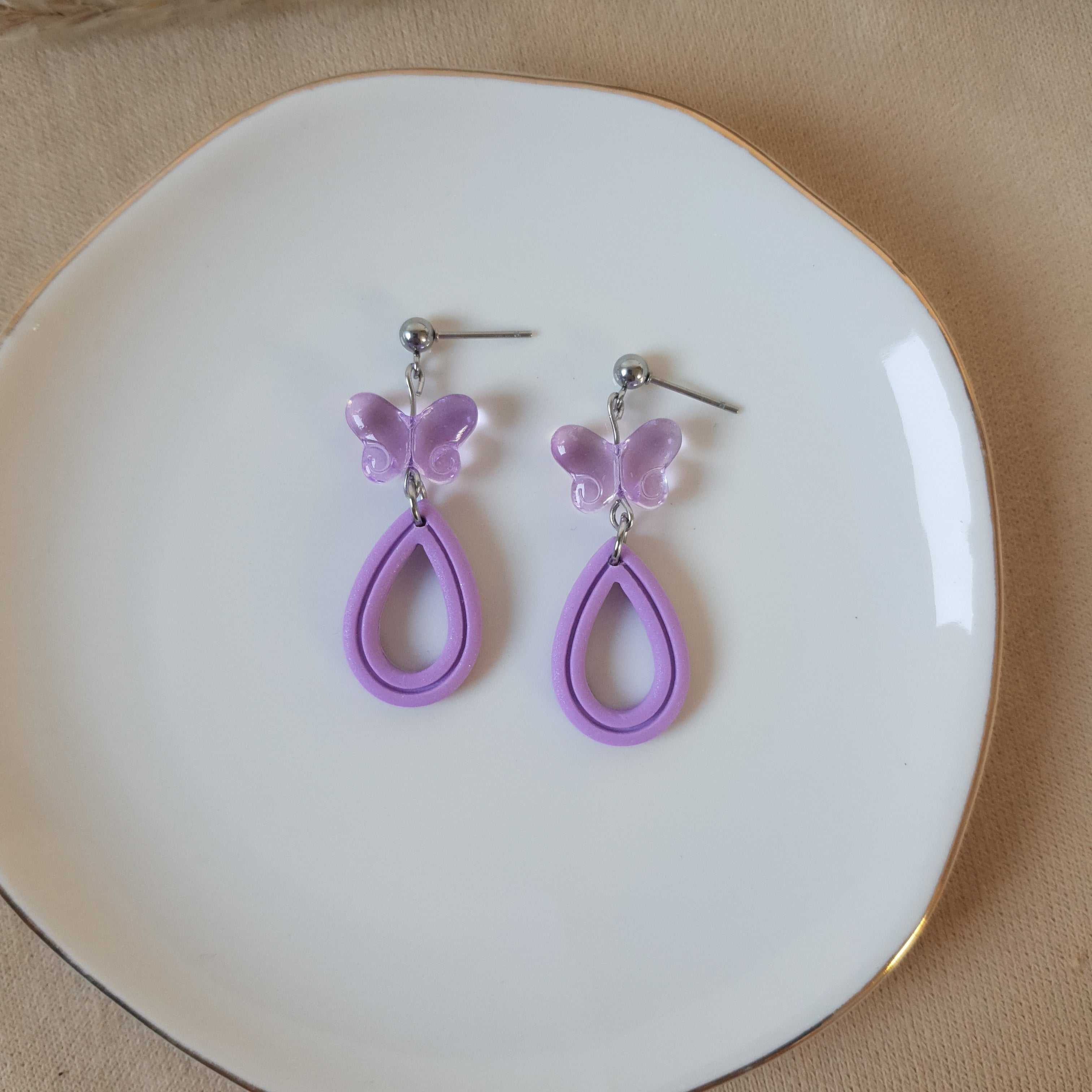 Lilac butterfly drops