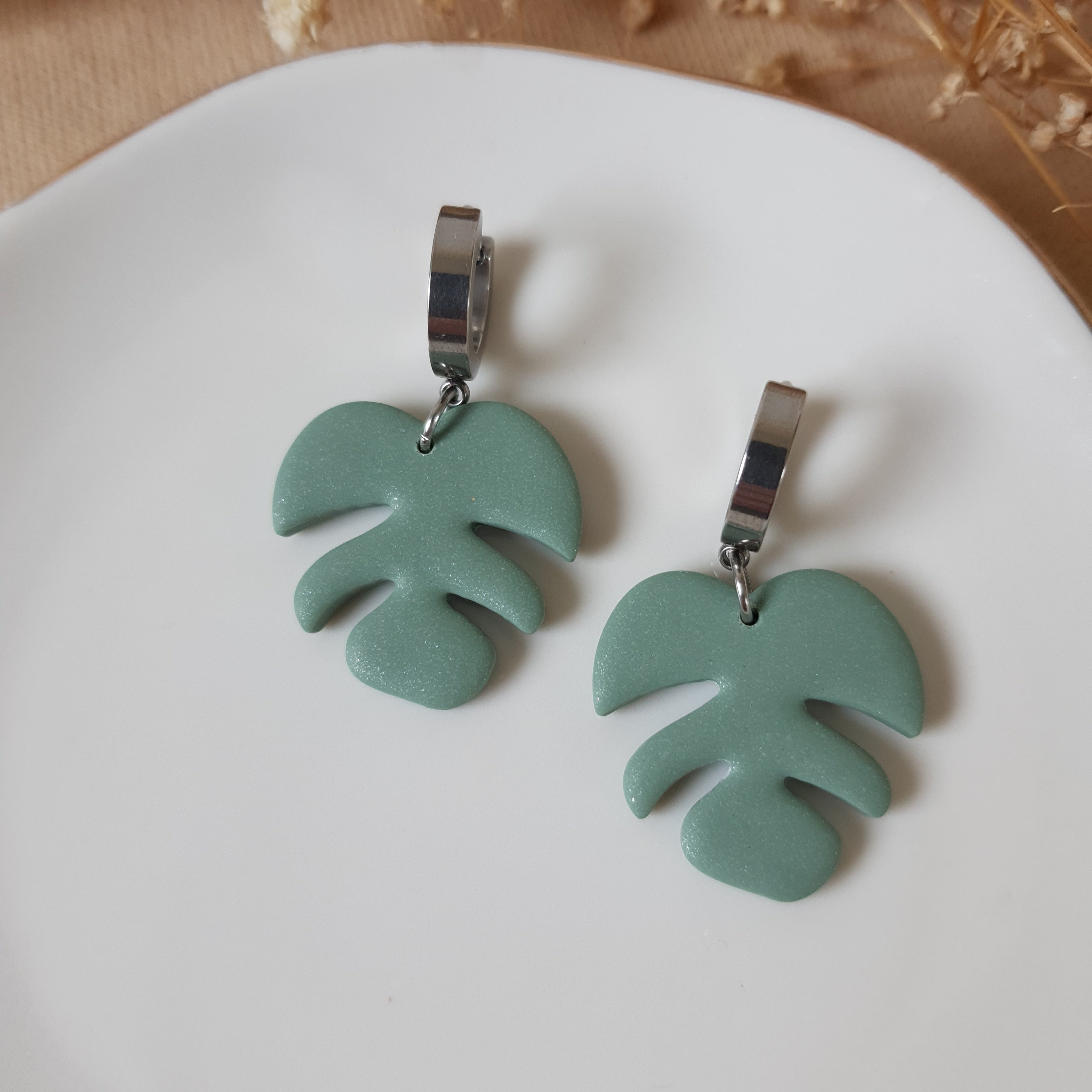 Sage monstera leaf earrings