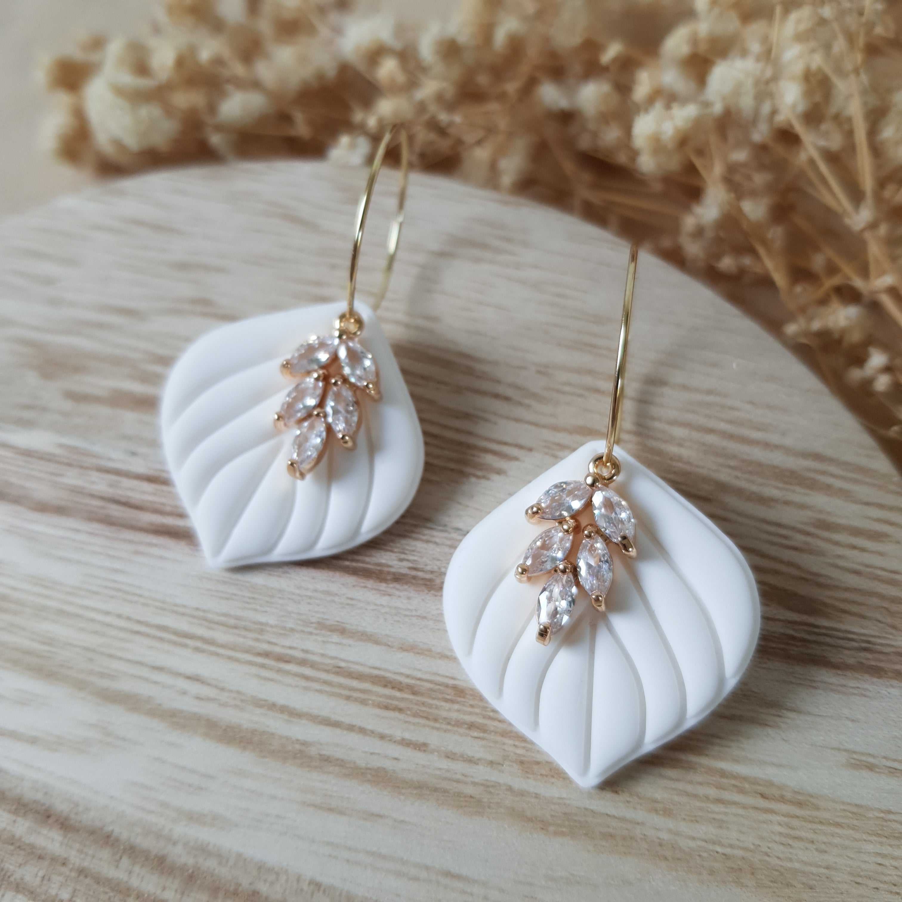White leaf hoop earrings