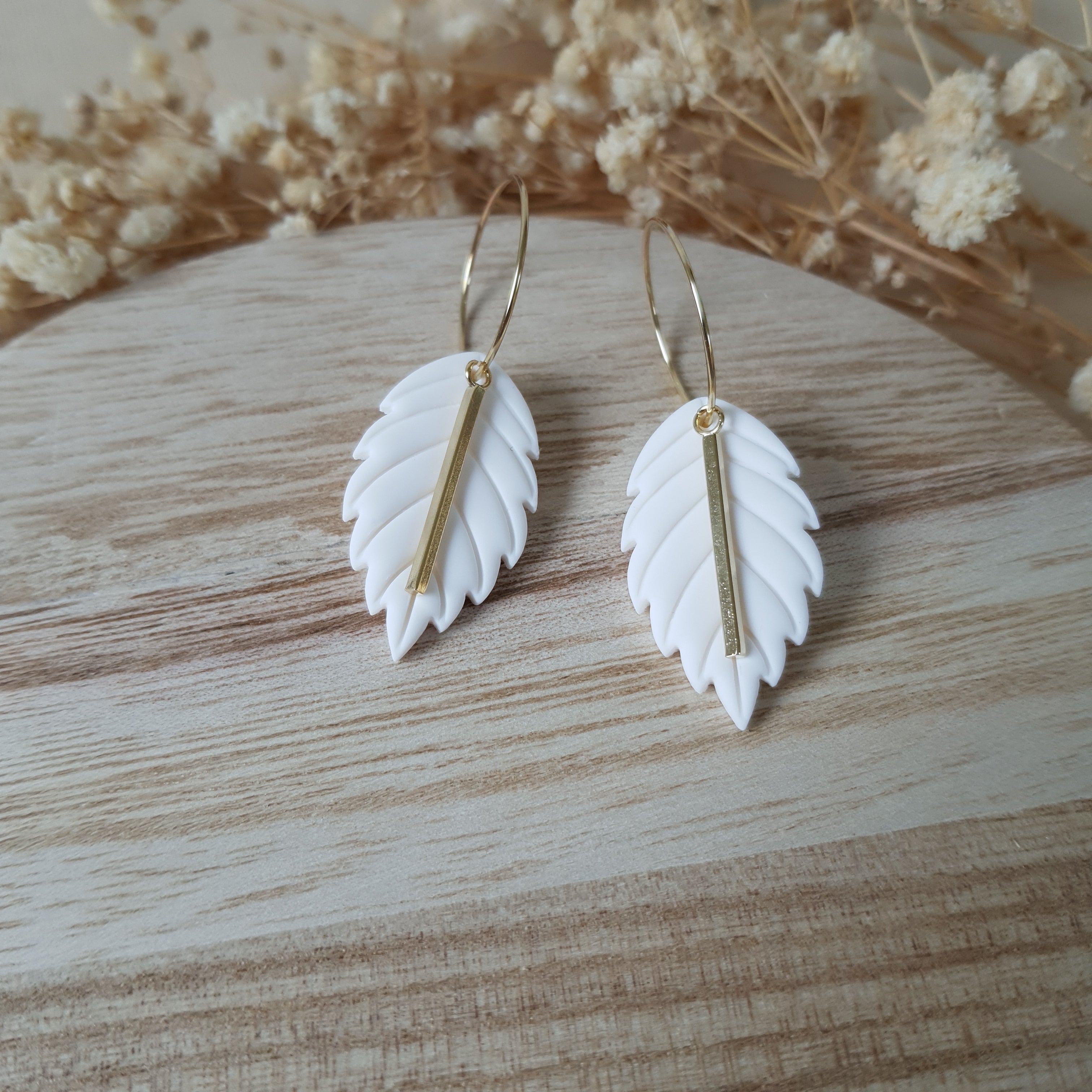 White apple leaf hoop earrings