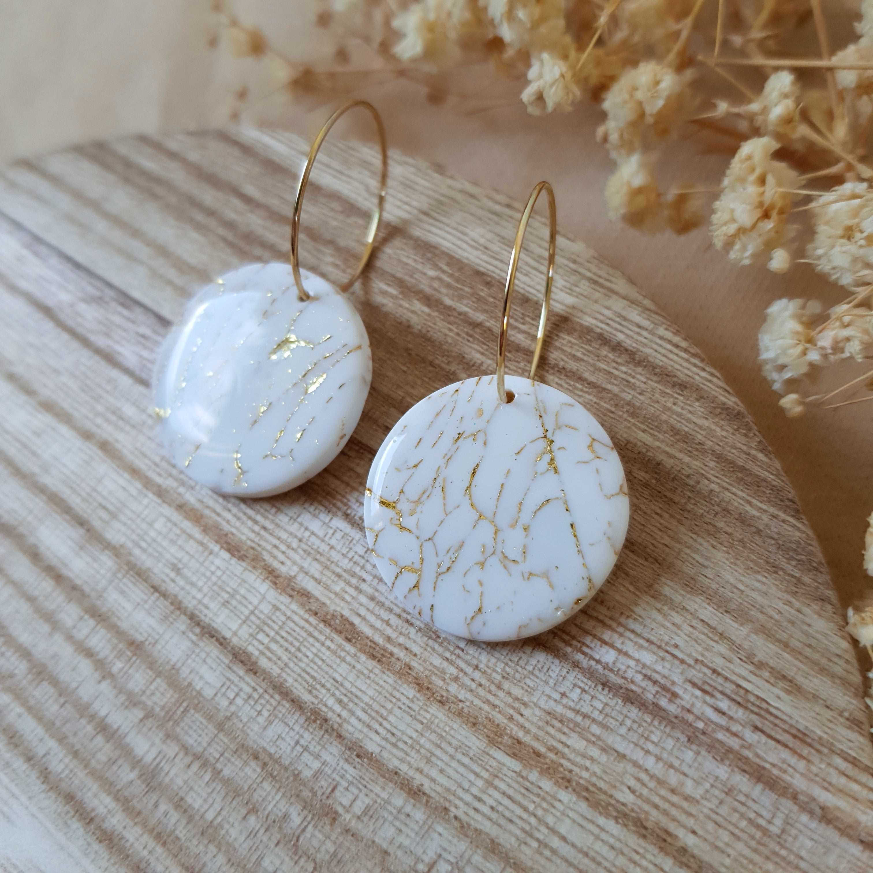 White and gold cracked hoops