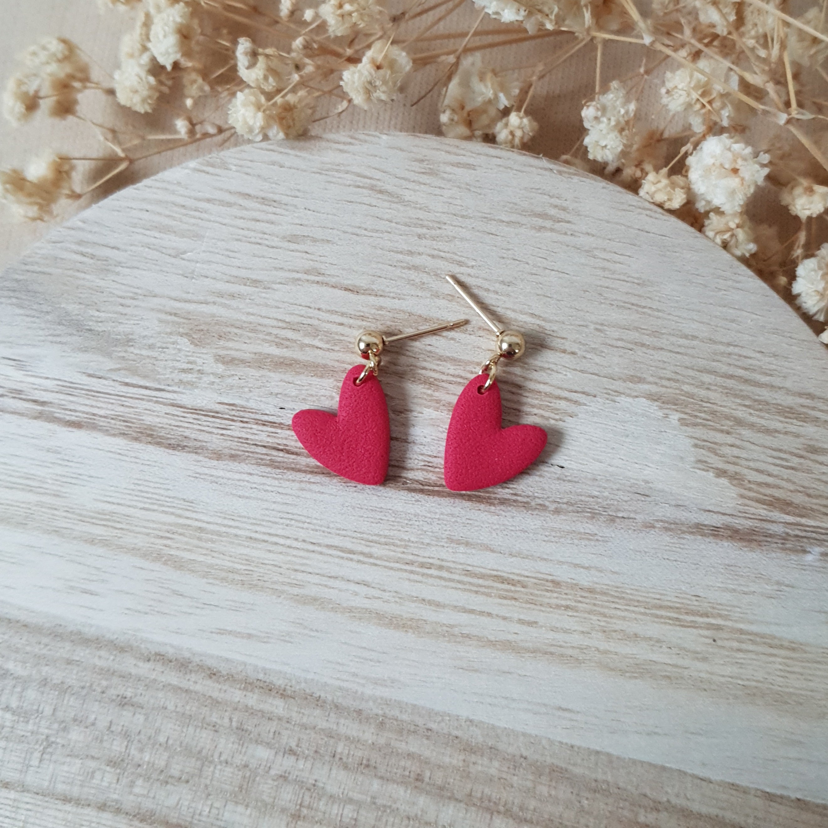 Asymmetric red hearts